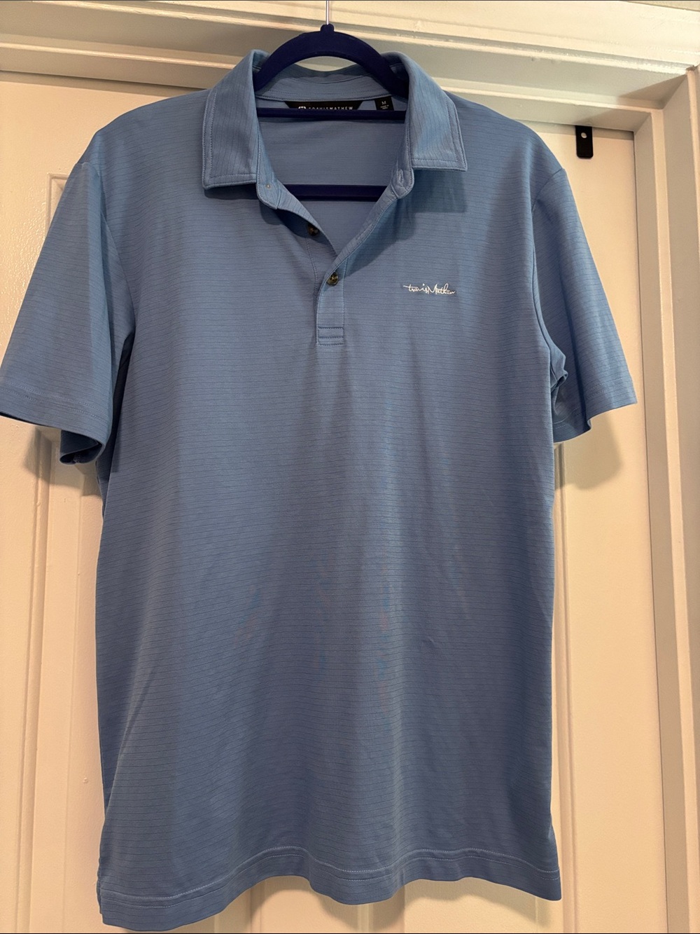 Travis Mathew Sky Blue Men’s Polo with Subtle Logo